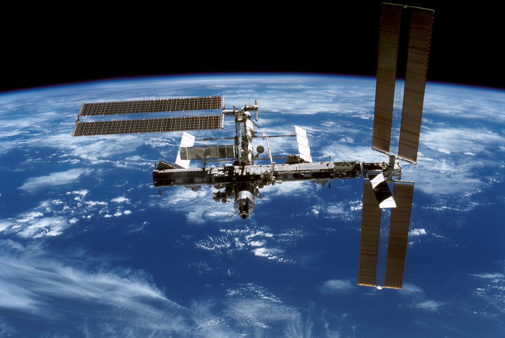Released to Public: International Space Station Above Earth, December 2006 (NASA) — related to Solar financing